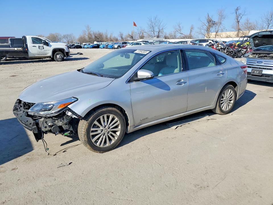 TOYOTA AVALON HYB 2014 with VIN 4T1BD1EB1EU031007 - Photo from auction