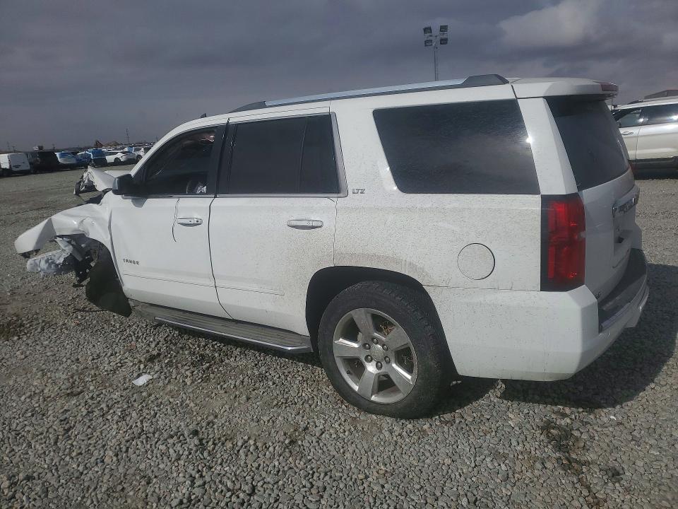 Photo 2 from auction – 2015 CHEVROLET TAHOE with VIN 1GNSKCKC0FR284351