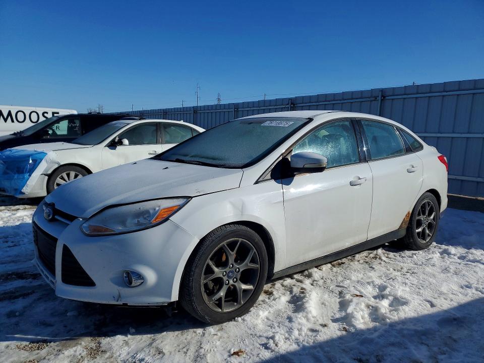 FORD FOCUS 2013 with VIN 1FADP3F22DL308630 - Photo from auction