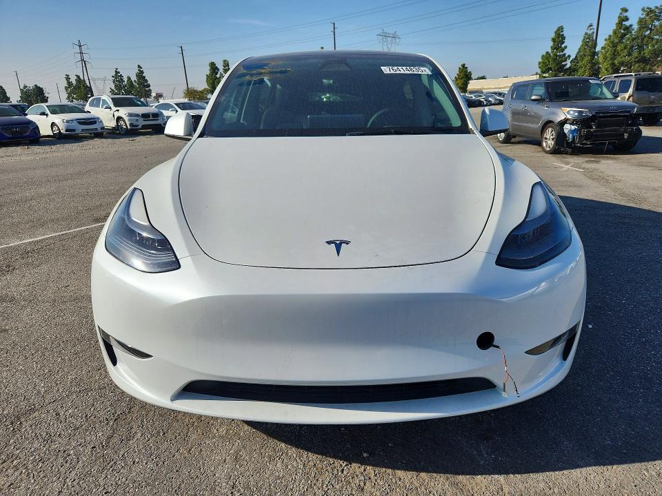 Photo 5 from auction – 2023 TESLA MODEL Y with VIN 7SAYGDED5PF946319