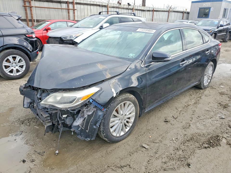 TOYOTA AVALON HYB 2014 with VIN 4T1BD1EB2EU034384 - Photo from auction