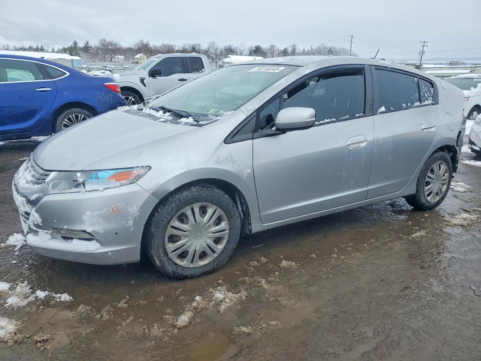 HONDA INSIGHT 2011 with VIN JHMZE2H5XBS011713 - Photo from auction
