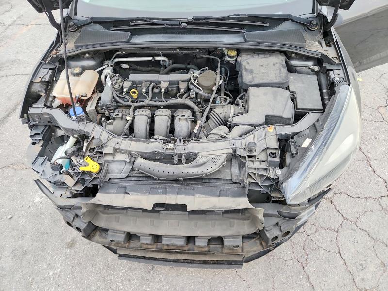 Photo 11 from auction – 2015 FORD FOCUS with VIN 1FADP3F2XFL280658