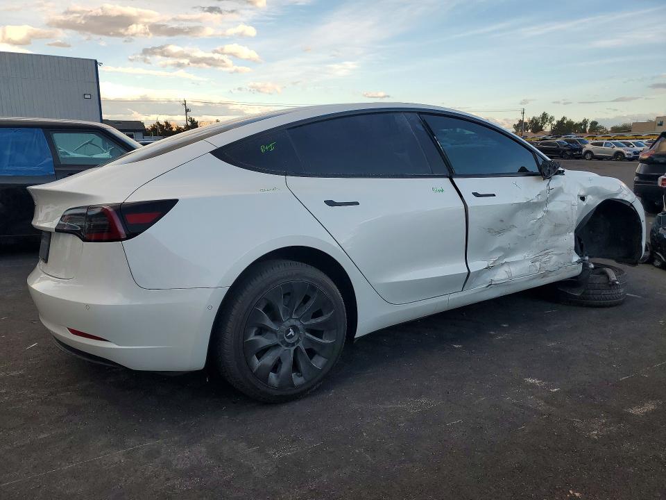 Photo 3 from auction – 2021 TESLA MODEL 3 with VIN 5YJ3E1EA9MF987145