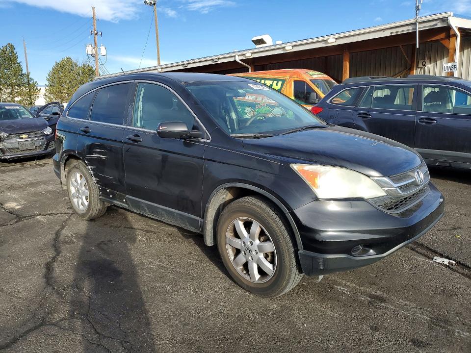 Photo 4 from auction – 2011 HONDA CR-V with VIN 5J6RE3H45BL055203