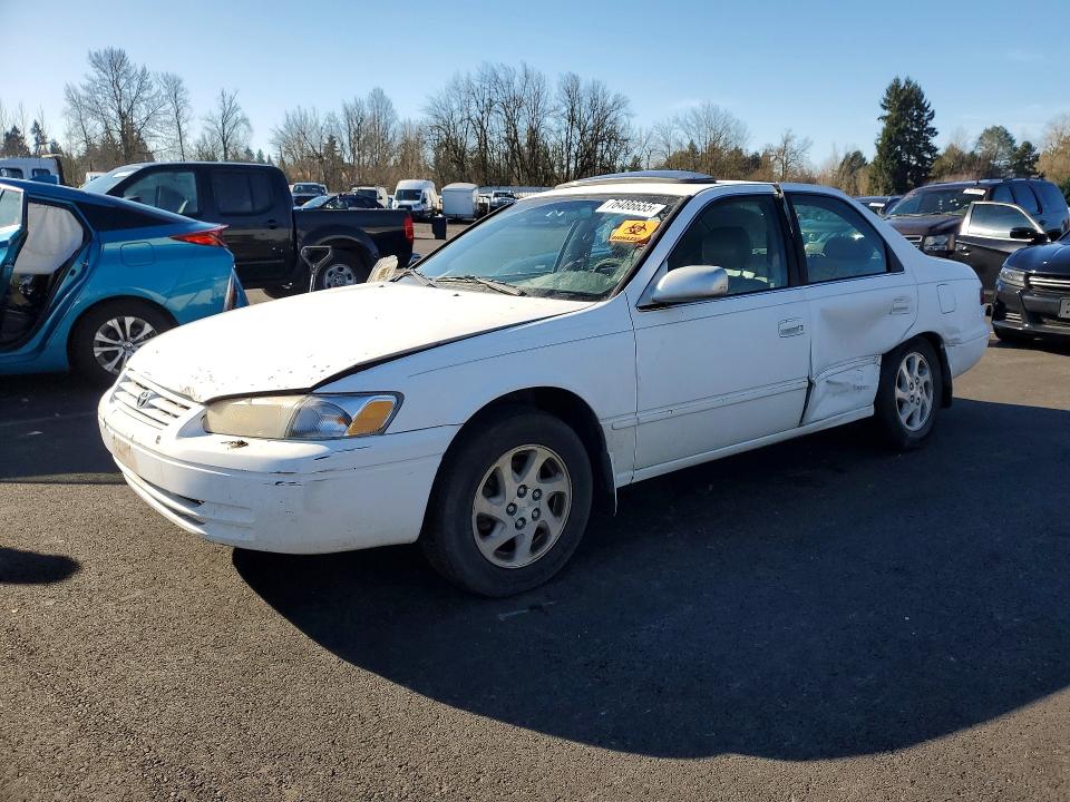 TOYOTA CAMRY LE 1999 with VIN JT2BF22K0X0185736 - Photo from auction