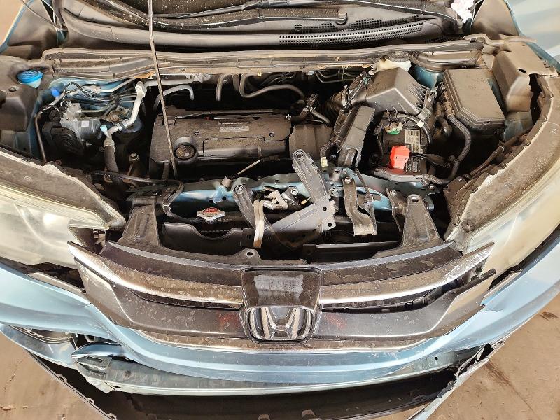 Photo 12 from auction – 2016 HONDA CR-V with VIN 2HKRM3H72GH556080