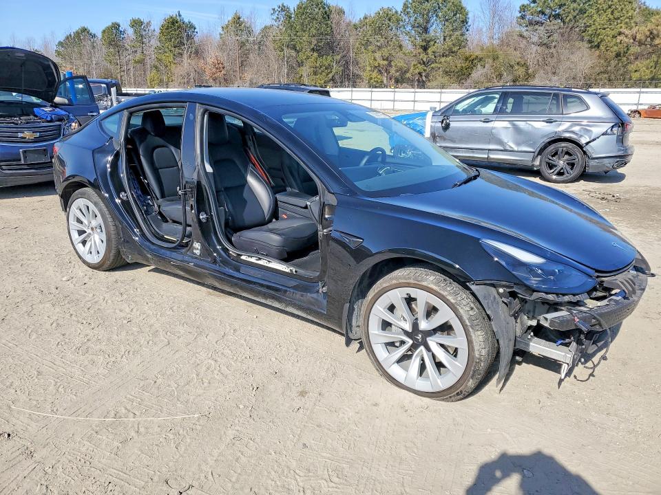 Photo 4 from auction – 2022 TESLA MODEL 3 with VIN 5YJ3E1EB6NF183265
