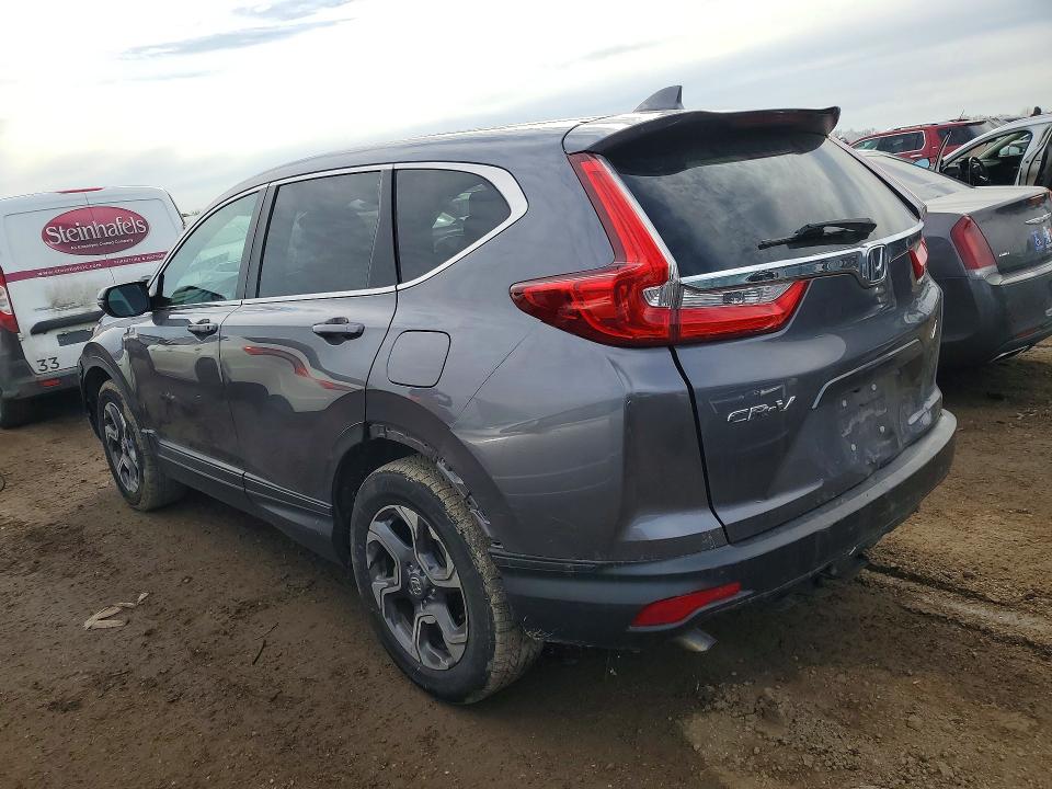 Photo 2 from auction – 2018 HONDA CR-V EX with VIN 7FARW2H55JE097088