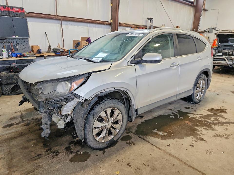 HONDA CR-V 2013 with VIN 2HKRM4H93DH103301 - Photo from auction