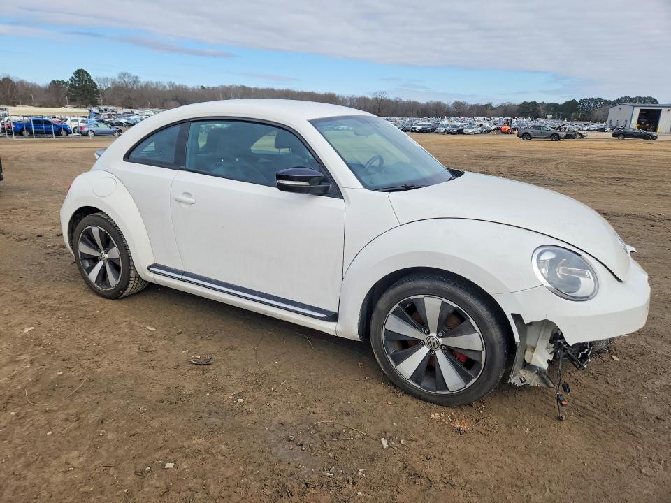 Photo 4 from auction – 2012 VOLKSWAGEN BEETLE with VIN 3VWV67AT2CM664532