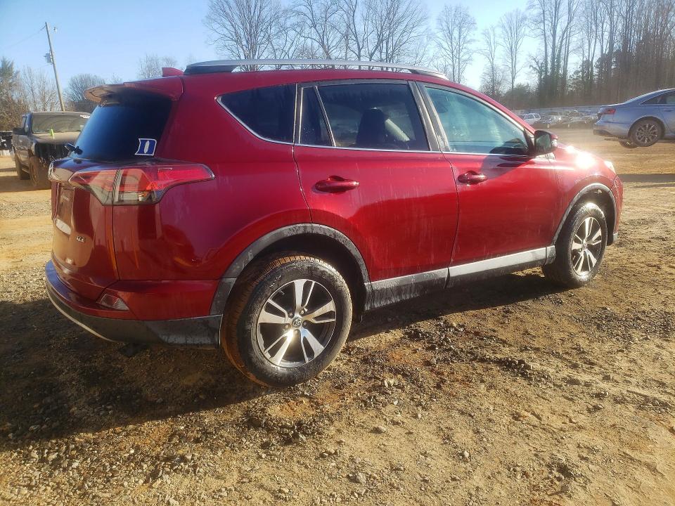 Photo 3 from auction – 2018 TOYOTA RAV4 with VIN 2T3WFREV4JW474516