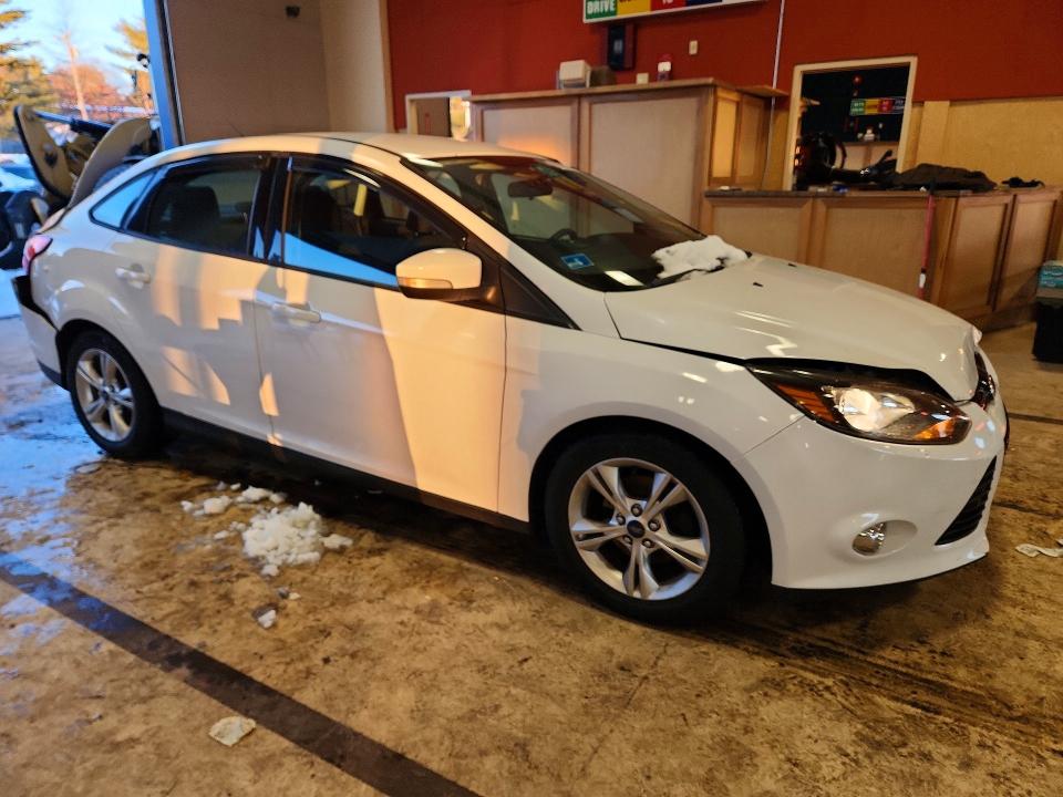 Photo 4 from auction – 2013 FORD FOCUS with VIN 1FADP3F22DL309499