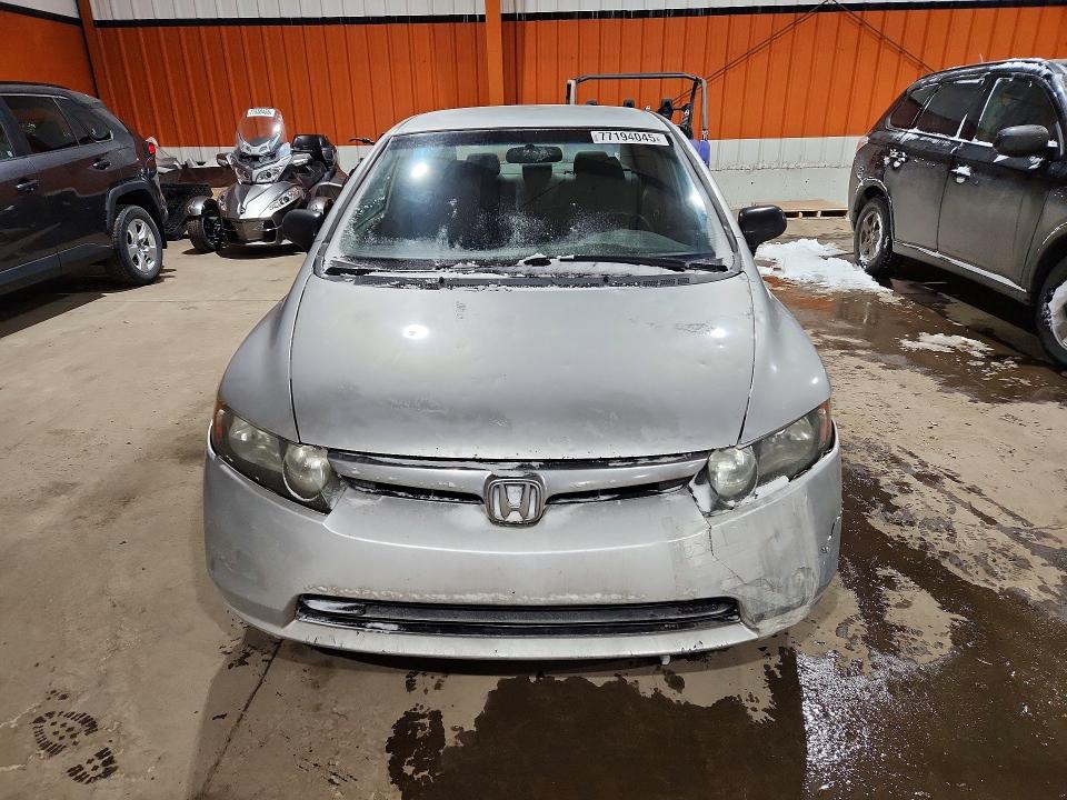 Photo 5 from auction – 2006 HONDA CIVIC DX with VIN 2HGFA15296H028487