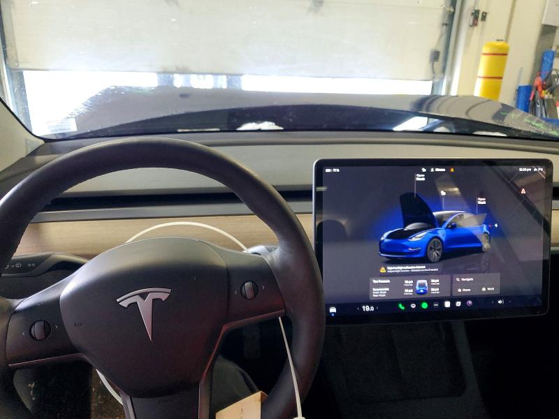 Photo 9 from auction – 2022 TESLA MODEL 3 with VIN 5YJ3E1EAXNF308906