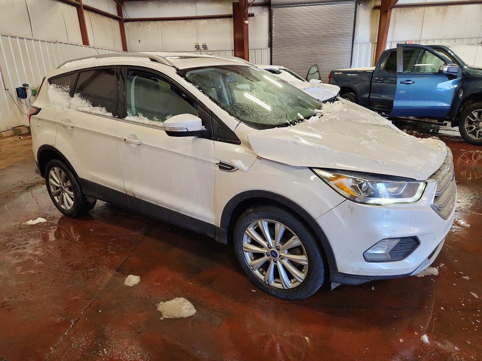 Photo 4 from auction – 2017 FORD ESCAPE with VIN 1FMCU0J97HUE91214