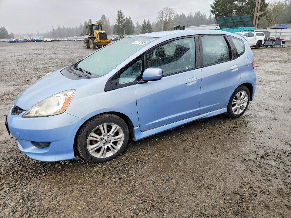 HONDA FIT 2009 with VIN JHMGE88409S054338 - Photo from auction