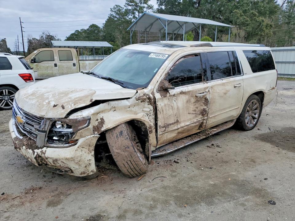 CHEVROLET SUBURBAN 2015 with VIN 1GNSKKKC3FR739655 - Photo from auction