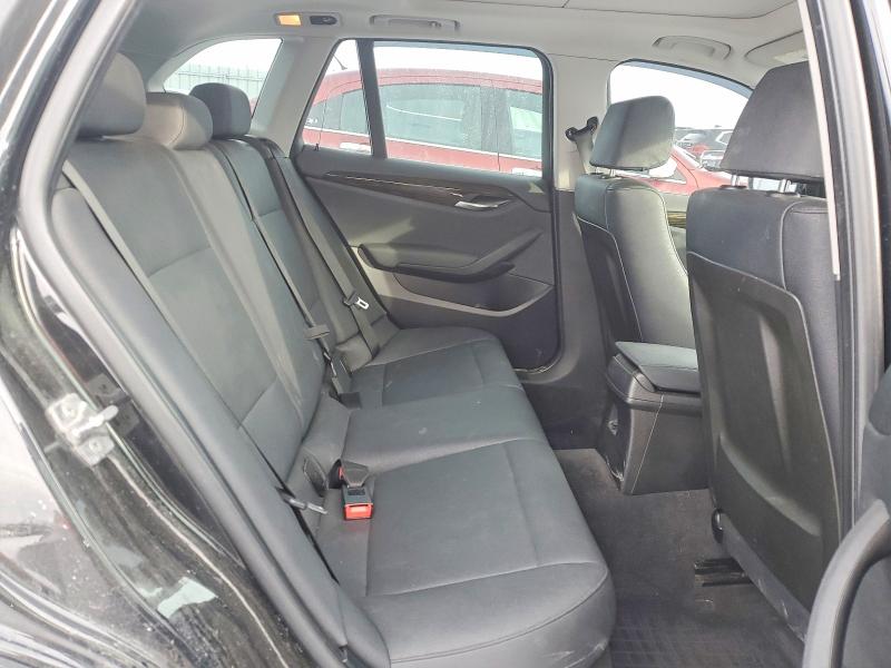 Photo 10 from auction – 2012 BMW X1 with VIN WBAVL1C51CVR78764