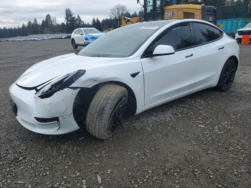 TESLA MODEL 3 2023 with VIN 5YJ3E1EA6PF449099 - Photo from auction