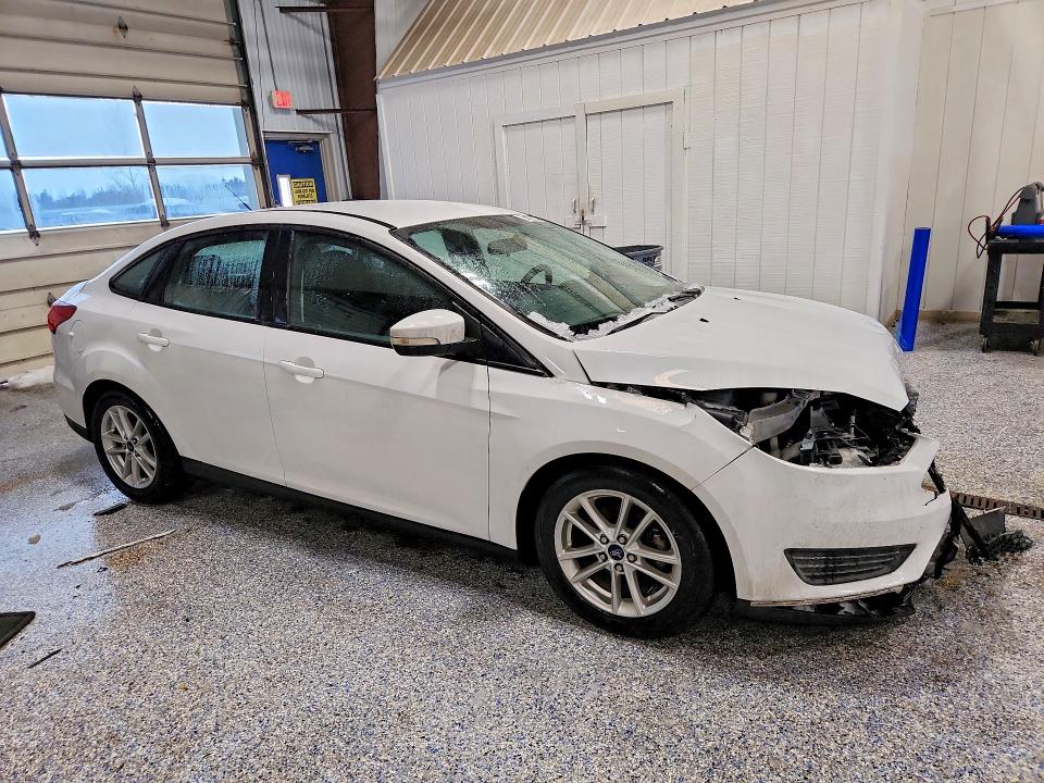 Photo 4 from auction – 2015 FORD FOCUS SE with VIN 1FADP3F20FL354119