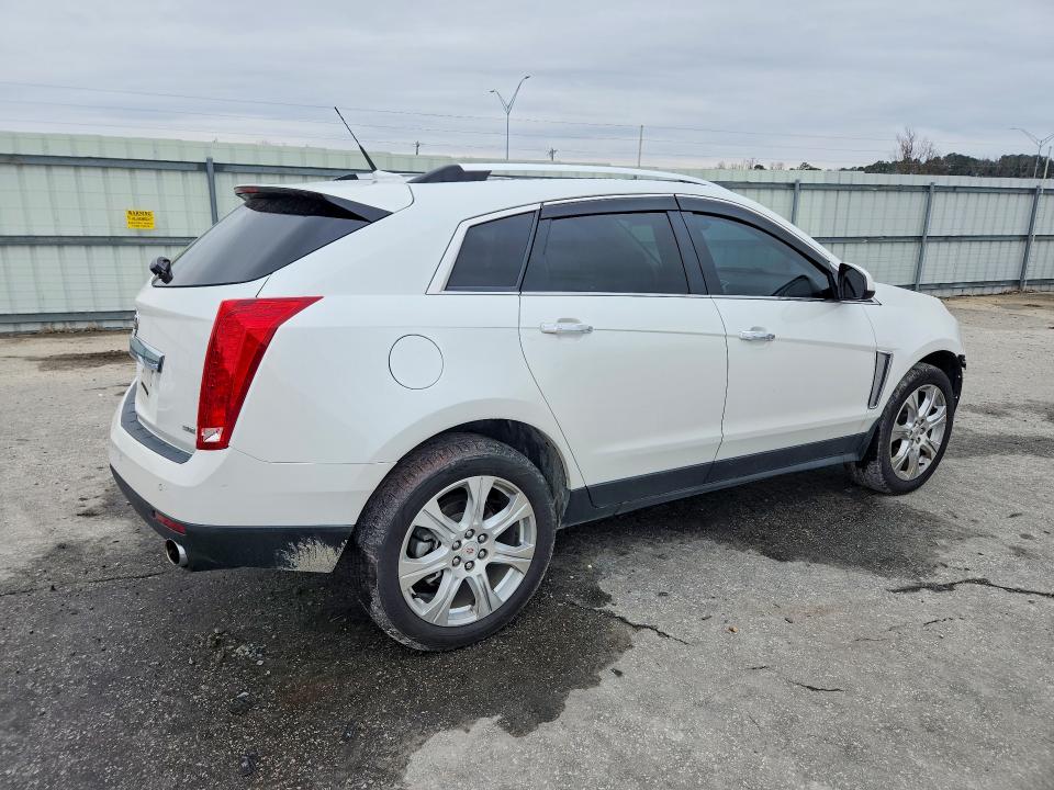 Photo 3 from auction – 2014 CADILLAC SRX PERFOR with VIN 3GYFNCE36ES616215