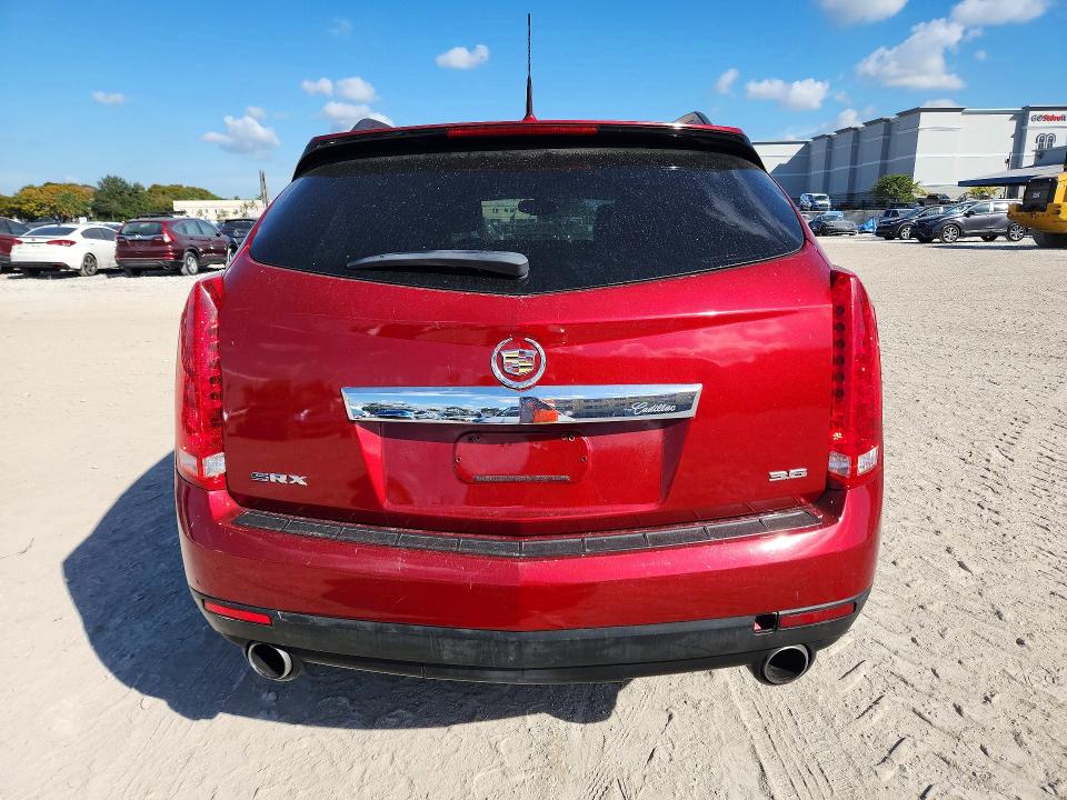Foto 6 de la subasta – 2014 CADILLAC SRX con VIN 3GYFNAE30ES658433