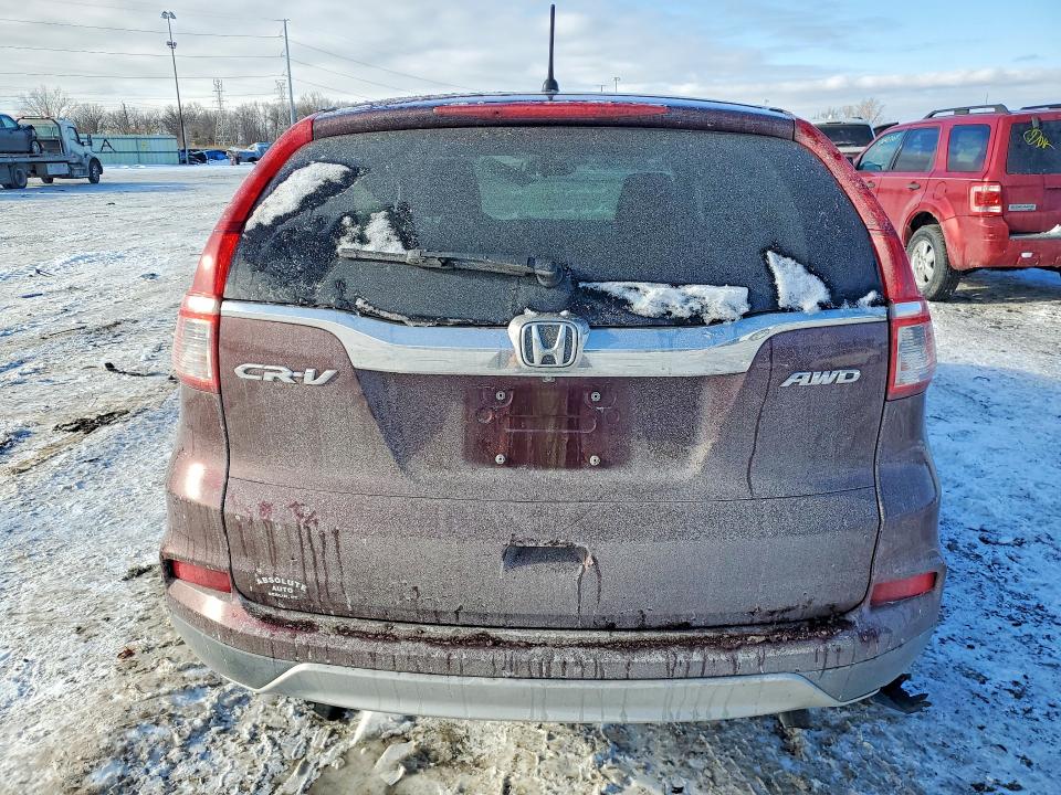 Photo 6 from auction – 2015 HONDA CR-V EX with VIN 2HKRM4H59FH641033