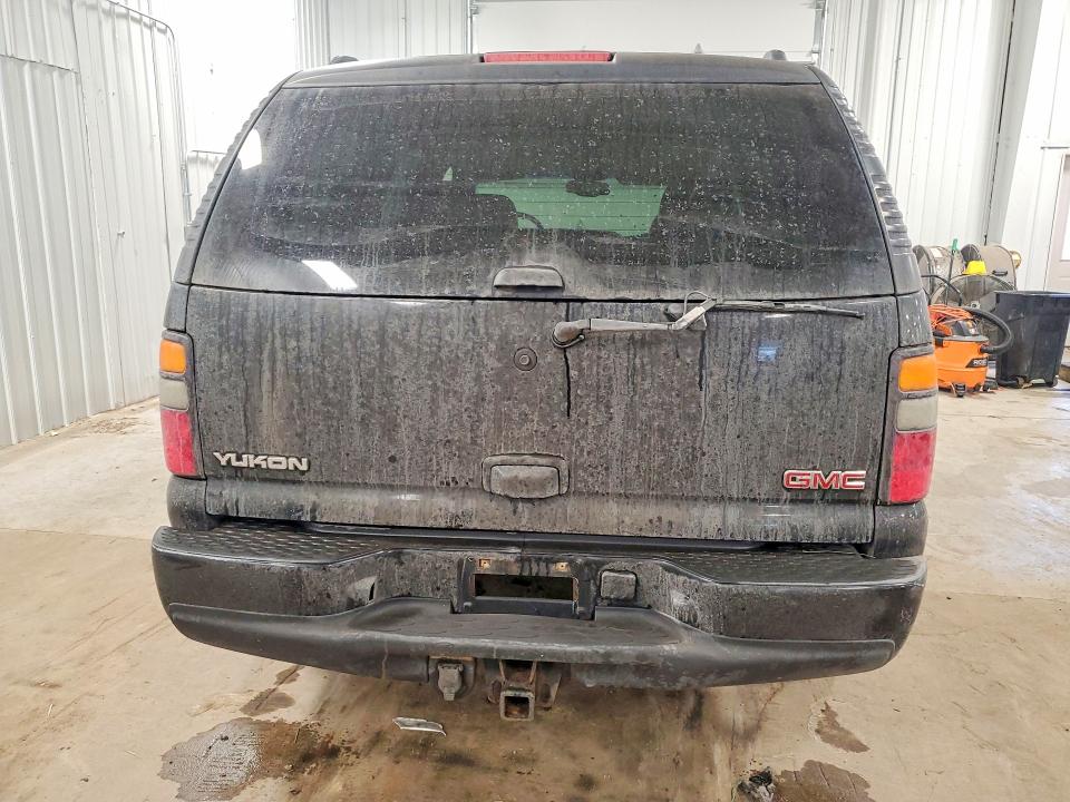 Photo 6 from auction – 2006 GMC YUKON DENA with VIN 1GKEK63U46J157877