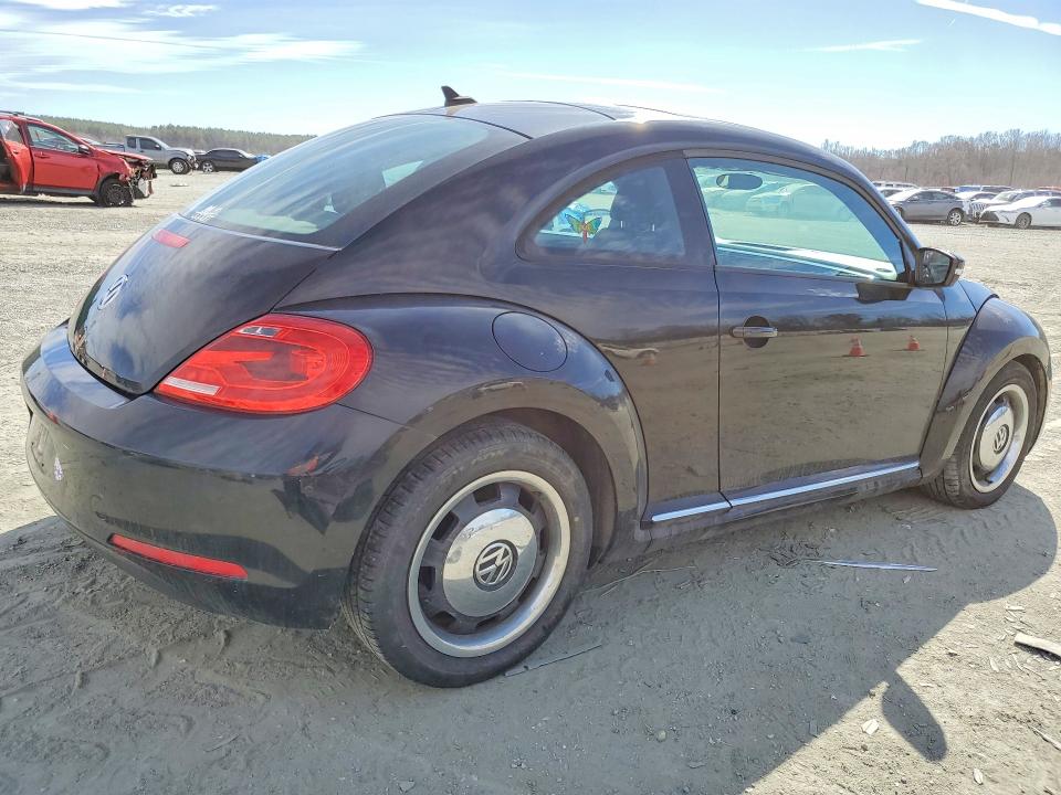 Photo 3 from auction – 2012 VOLKSWAGEN BEETLE with VIN 3VWJP7AT1CM665165