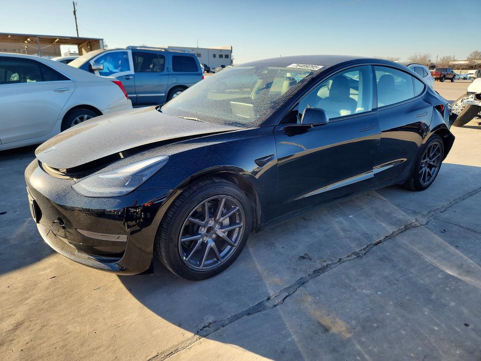 TESLA MODEL 3 2022 with VIN 5YJ3E1EAXNF187228 - Photo from auction