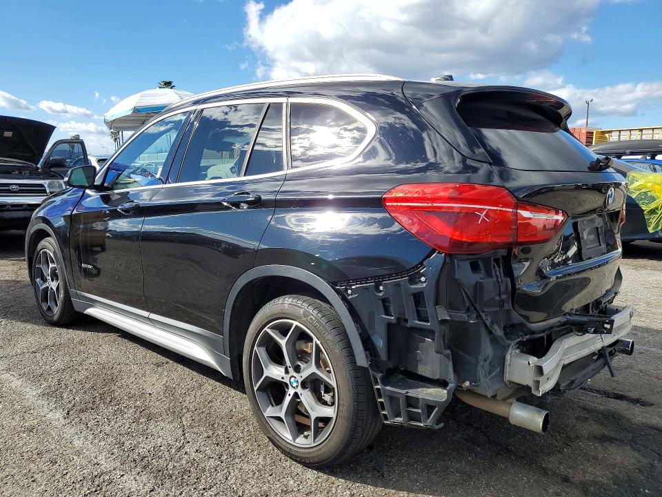 Photo 2 from auction – 2016 BMW X1 with VIN WBXHT3Z32G4A50562