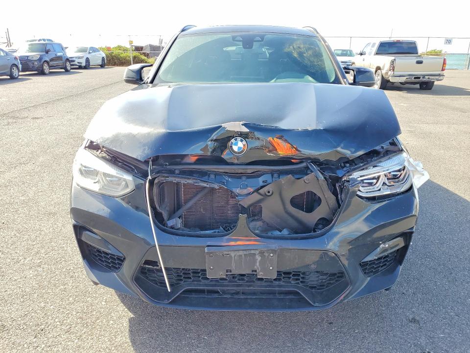 Photo 5 from auction – 2020 BMW X4 with VIN 5YMUJ0C0XLLU67219