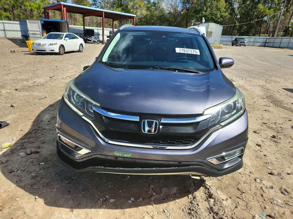 Photo 5 from auction – 2015 HONDA CR-V TOURI with VIN 5J6RM3H90FL002395