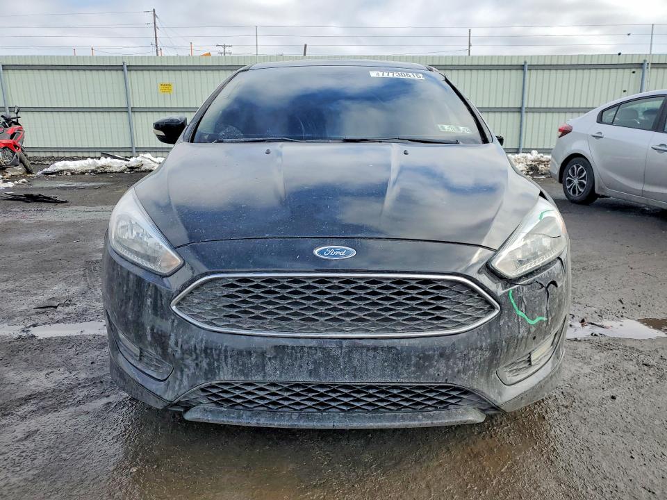 Photo 5 from auction – 2016 FORD FOCUS with VIN 1FADP3F21GL367544