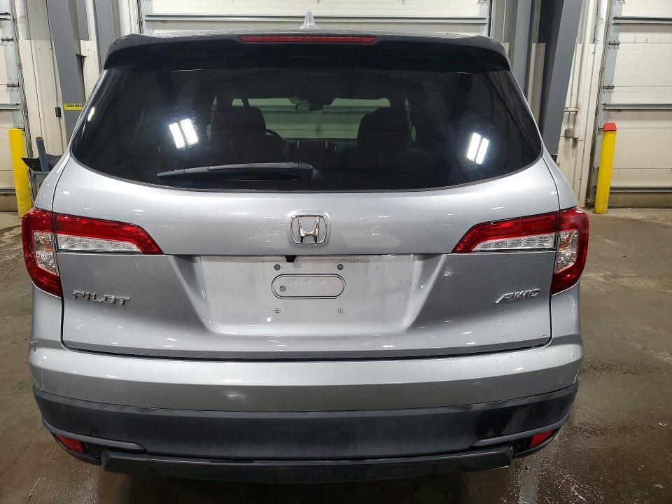 Photo 6 from auction – 2021 HONDA PILOT LX with VIN 5FNYF6H10MB013792