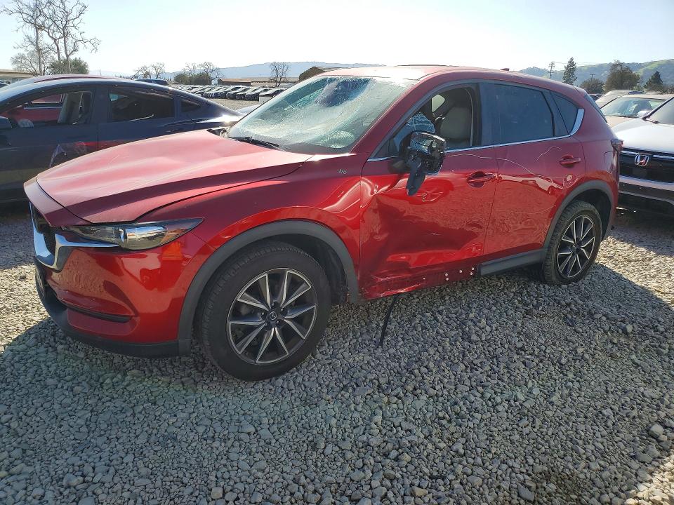 MAZDA CX-5 2018 with VIN JM3KFACMXJ0326490 - Photo from auction