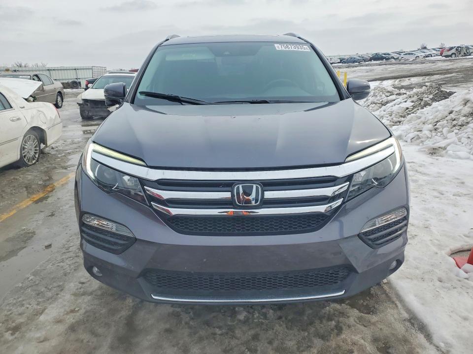 Photo 5 from auction – 2016 HONDA PILOT TOUR with VIN 5FNYF6H9XGB092544