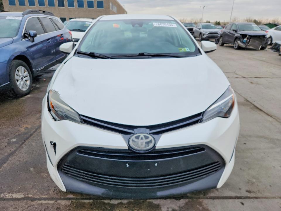 Photo 5 from auction – 2018 TOYOTA COROLLA with VIN 5YFBURHE2JP743476