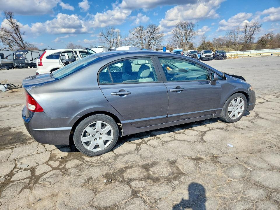 Photo 3 from auction – 2010 HONDA CIVIC with VIN 19XFA1F50AE038692