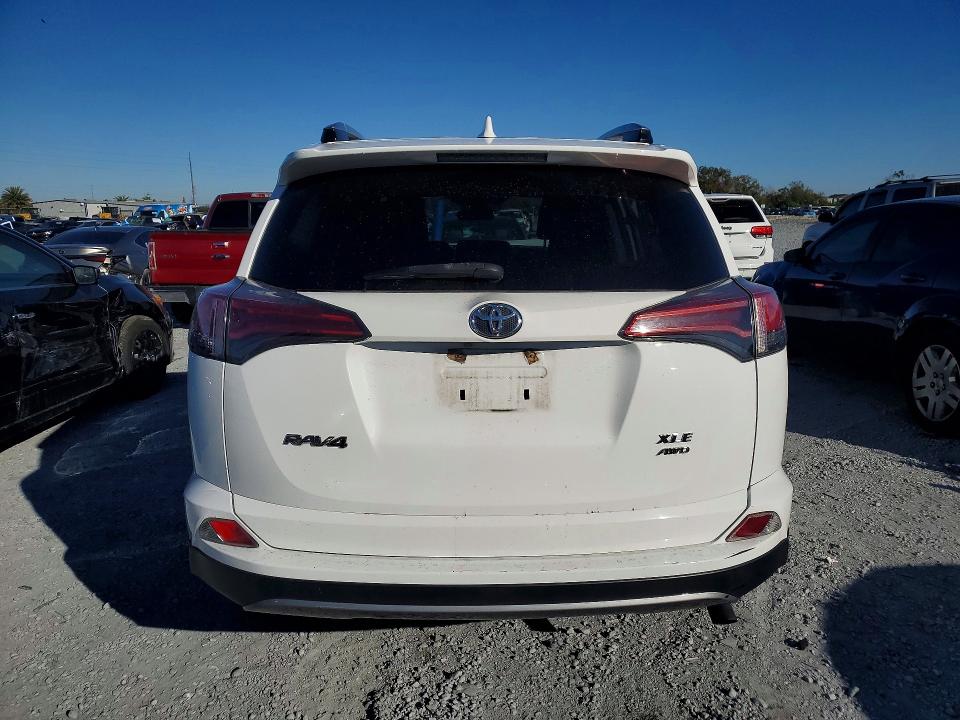 Photo 6 from auction – 2018 TOYOTA RAV4 with VIN 2T3RFREV1JW706227