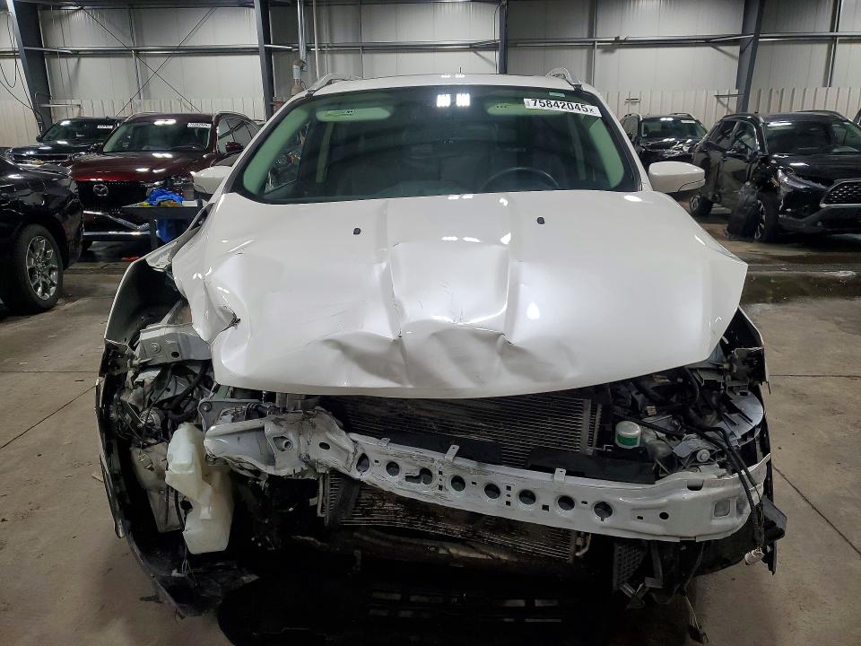 Photo 5 from auction – 2015 FORD ESCAPE TIT with VIN 1FMCU9J94FUC26204