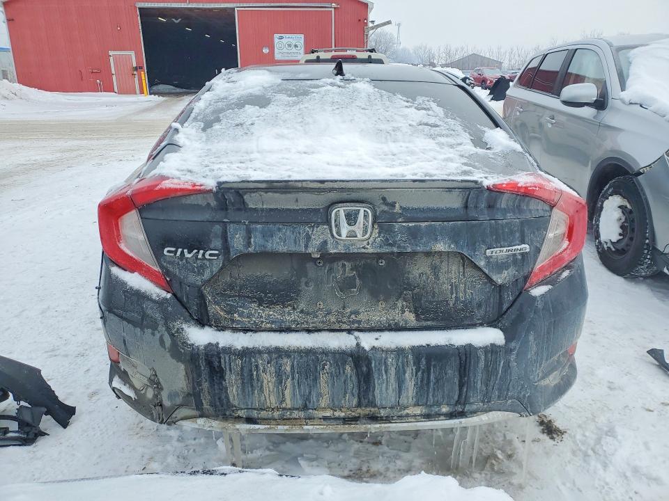 Photo 6 from auction – 2019 HONDA CIVIC TOUR with VIN 2HGFC1F97KH104238