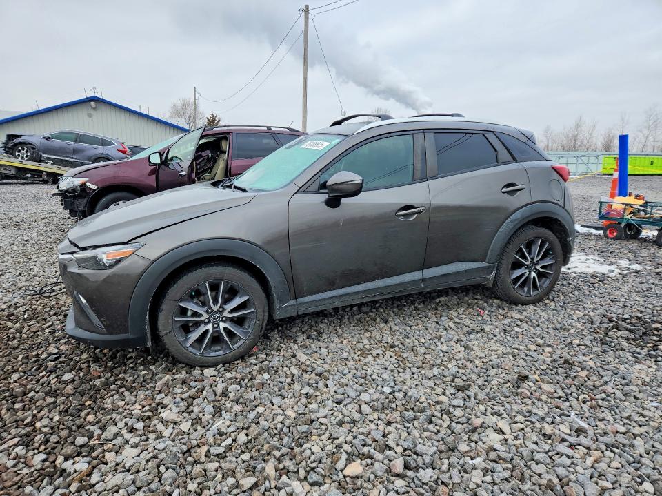 MAZDA CX-3 2018 with VIN JM1DKFC79J0312553 - Photo from auction