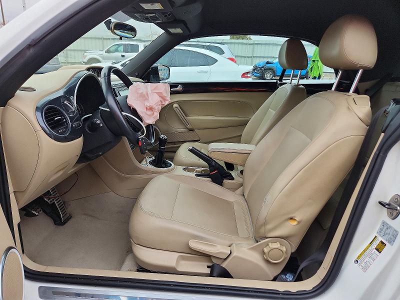 Photo 7 from auction – 2014 VOLKSWAGEN BEETLE TUR with VIN 3VW8S7ATXEM803687