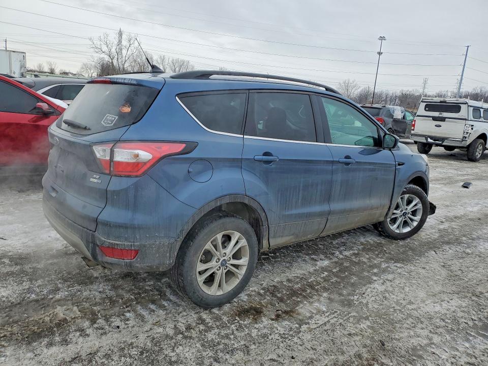 Photo 3 from auction – 2018 FORD ESCAPE with VIN 1FMCU9GDXJUB51447
