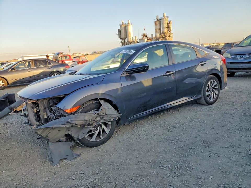 HONDA CIVIC 2018 with VIN 2HGFC2F70JH511322 - Photo from auction