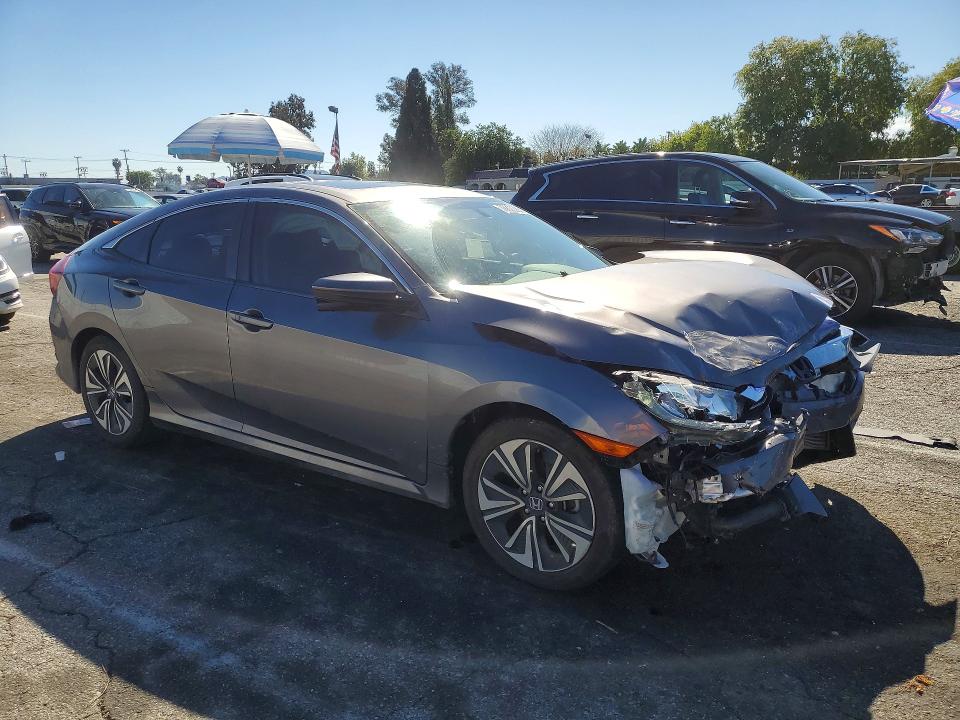 Photo 4 from auction – 2018 HONDA CIVIC with VIN JHMFC1F77JX041972