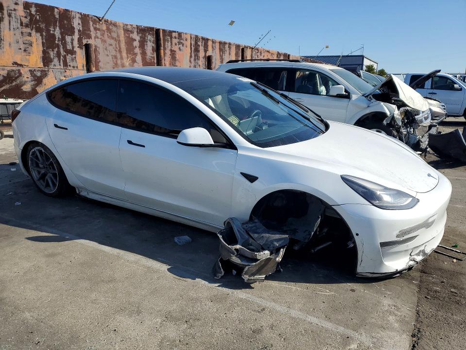 Photo 4 from auction – 2021 TESLA MODEL 3 with VIN 5YJ3E1EA4MF018479