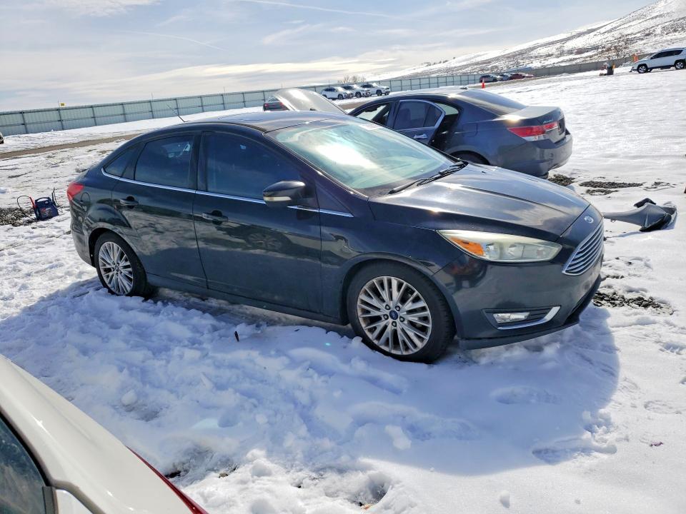 Photo 4 from auction – 2015 FORD FOCUS with VIN 1FADP3J21FL363239
